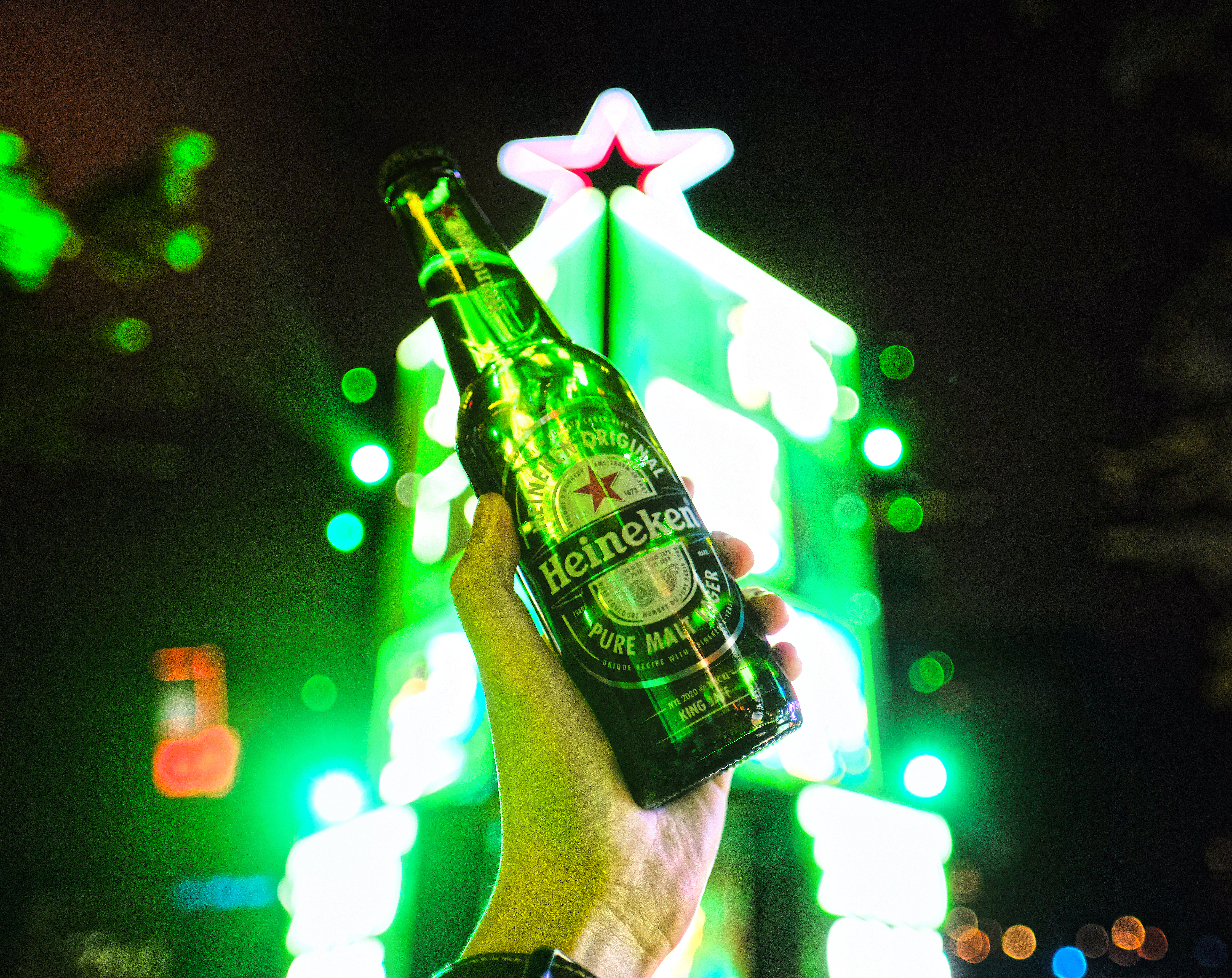 Bottle of Heineken® in front of the Star Tower-v2